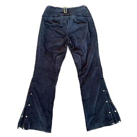 Pantalones con cinturón y botones laterales Gucci por Tom Ford a principios de los 2000.