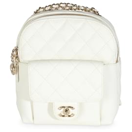 Mochila de mano Chanel pequeña CC de caviar blanco acolchado