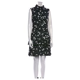 Abito Chanel Pre-Fall 2022 in tweed nero lana