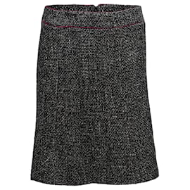 Falda de tweed Chanel otoño/invierno 2003 en blanco y negro vintage talla FR 46