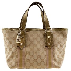 Bolso de mano Gucci marrón de lona GG y cuero
