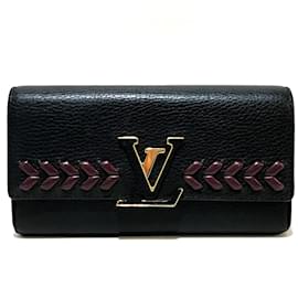 Billetera bi-fold Taurillon Clemence de Louis Vuitton