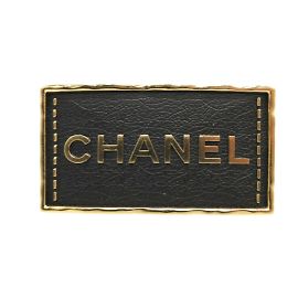 Spilla in pelle metallo nero oro Chanel A23S