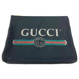 Clutch in pelle nera Gucci 500981