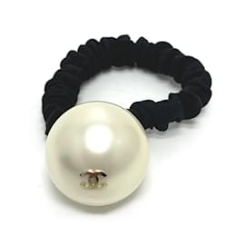 Chanel CC Marke F22V Haargummi