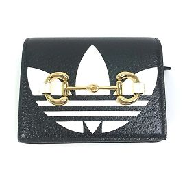 Billetera de cuero plegable Gucci