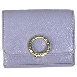 Bulgari Billetera compacta trifold de cuero púrpura Bvlgari