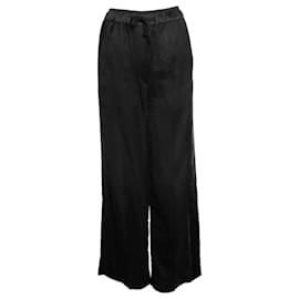 Sandro, pantalón negro con ribete de satén