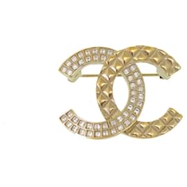 Broche en or avec strass Chanel Coco Mark B17C