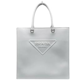 Borsa tote in pelle goffrata Prada con triangolo