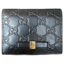 Cartera compacta de cuero negra Gucci