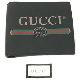 Billetera de cuero plegable Gucci