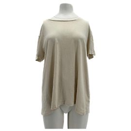 Nili Lotan supera a T.International M Cotton