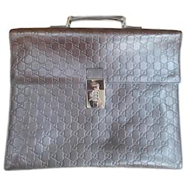 Portadocumenti Gucci in pelle monogramma