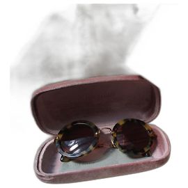 Miu Miu Gafas de sol de gran tamaño, efecto carey.