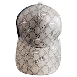 Berretto Gucci in pelle nero e marrone chiaro