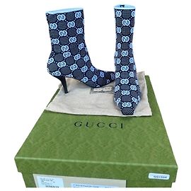 Botas de bico fino em tricô GG da Gucci
