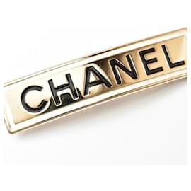 Fermaglio dorato Chanel