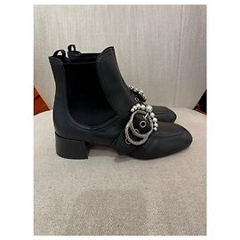 Botas de tobillo MIU MIU T.EU 37 Cuero