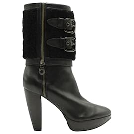 Botines de piel de visón Burberry en cuero negro