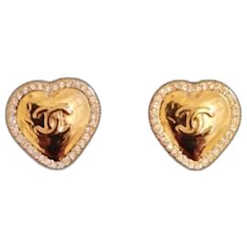 Orecchini Chanel dorati in metallo con strass