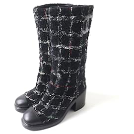 Botas largas de cuero y tweed Chanel G39614 negras