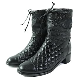Schwarze Lederkurze Stiefel COCO Mark von Chanel G34096