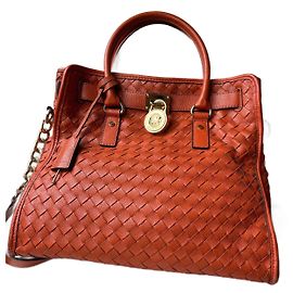 Borsa Michael Kors Hamilton in pelle intrecciata arancione