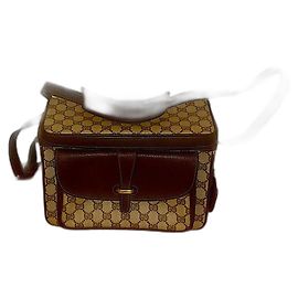 Bolsa transversal vintage Gucci autêntica rara com monograma GG e fecho de caixa.