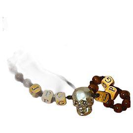 Jean Paul Gaultier Collar de colgante de calavera de madera con cuentas de logo de archivo vintage auténtico de Gaultier