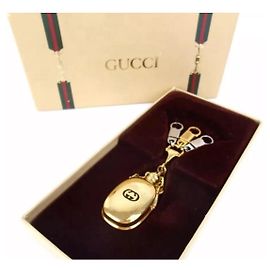 Bottiglia di profumo vintage placcata in oro Gucci