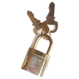 Louis Vuitton Charm per borsa Lucchetto Special Series Travel Oro