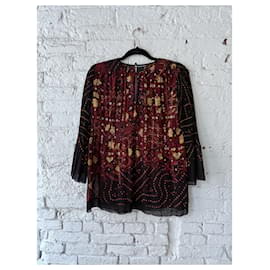 Autre Marque Blusa plisada de malla Vivienne Tam