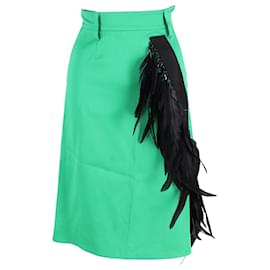 Falda A-line de lana verde con ribete de plumas, longitud hasta la rodilla de Prada