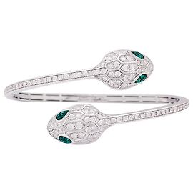 Bracciale Bulgari 'Serpenti Seduttori' in oro bianco, diamanti, smeraldi.