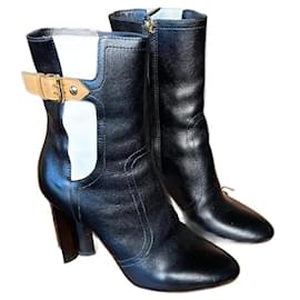 Stivaletti con tacco fiore Louis Vuitton Silhouette in pelle nera
