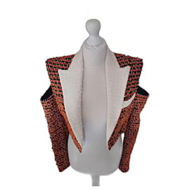 Chaqueta Balmain de tweed naranja con hombros descubiertos