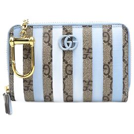 Portafoglio in tela GG Supreme di Gucci