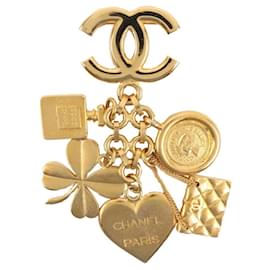 Spilla a forma di cuore a quadrifoglio placcata in oro Chanel
