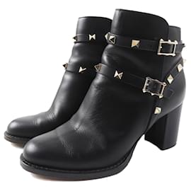 Botas cortas de cuero Valentino negras y doradas 35,5