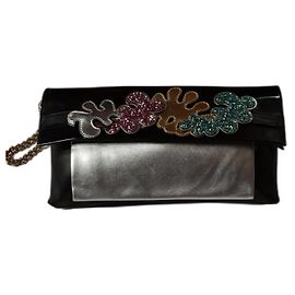 Clutch Christian Louboutin in pelle nera e argento