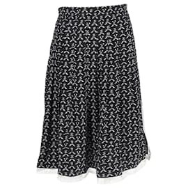 Saia midi plissada estampada de flores Chloé em algodão preto