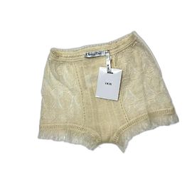 Pantalones cortos Christian Dior de lino y cachemira beige