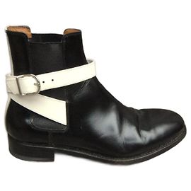 Balenciaga Stiefeletten aus Lackleder Schwarz Weiß
