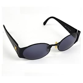 Chanel Sonnenbrille Schwarz und Gold Kunststoff