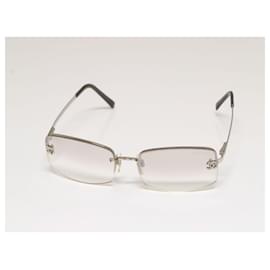 Chanel CC Logo Gafas de Sol Plateadas Transparentes Sin Montura con Rhinestones