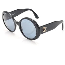 Chanel Sonnenbrille Schwarz Gold Kunststoff