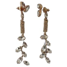 Orecchini Christian Dior in metallo dorato e cristalli