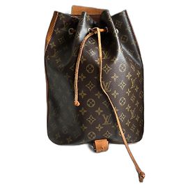 Louis Vuitton Rucksack aus Leder und Monogramm-Canvas Braun