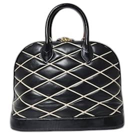 LOUIS VUITTON Borsa Alma PM in pelle di agnello Malletage Nero/Bianco